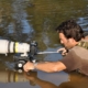 Camera operator uses Canon long lens