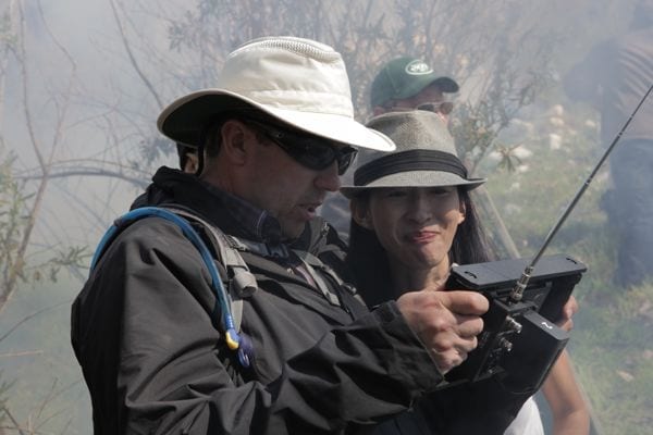 Shane Hurlbut and Director Po Chan viewing the shot