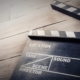 Film slate on wooden table