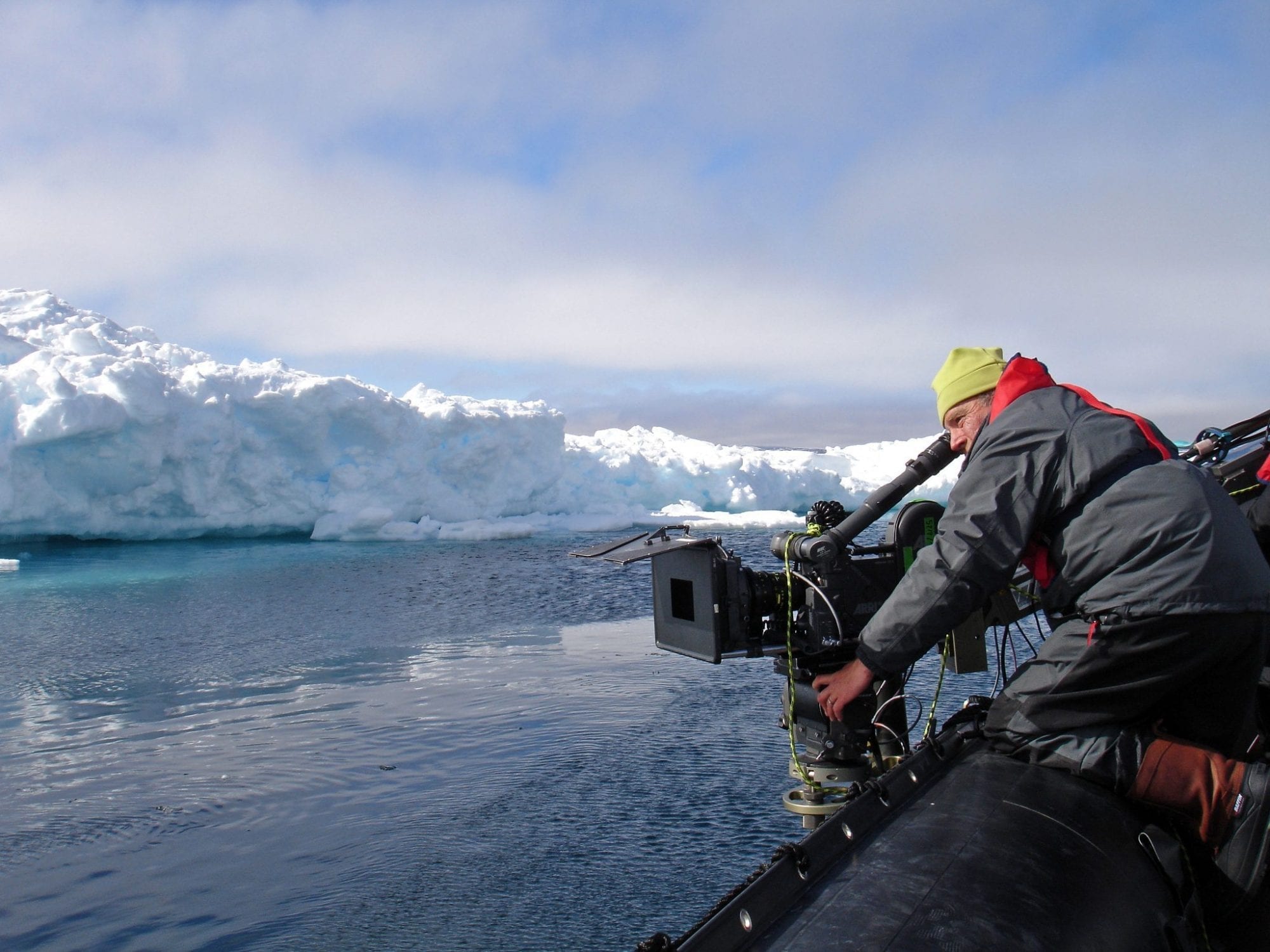 Cinematographer filming ice and water