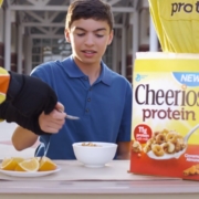 Boy at table with Cheerios cereal for commercial