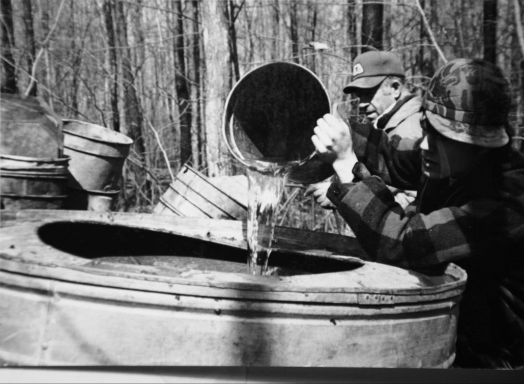 My Dad and Dan collecting sap from our Maple trees in our Sugar Bush in 1979