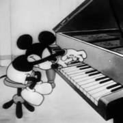 Mickey Mouse plays piano