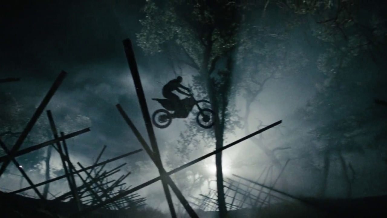 Movie action sequence - Man jumps dirtbike