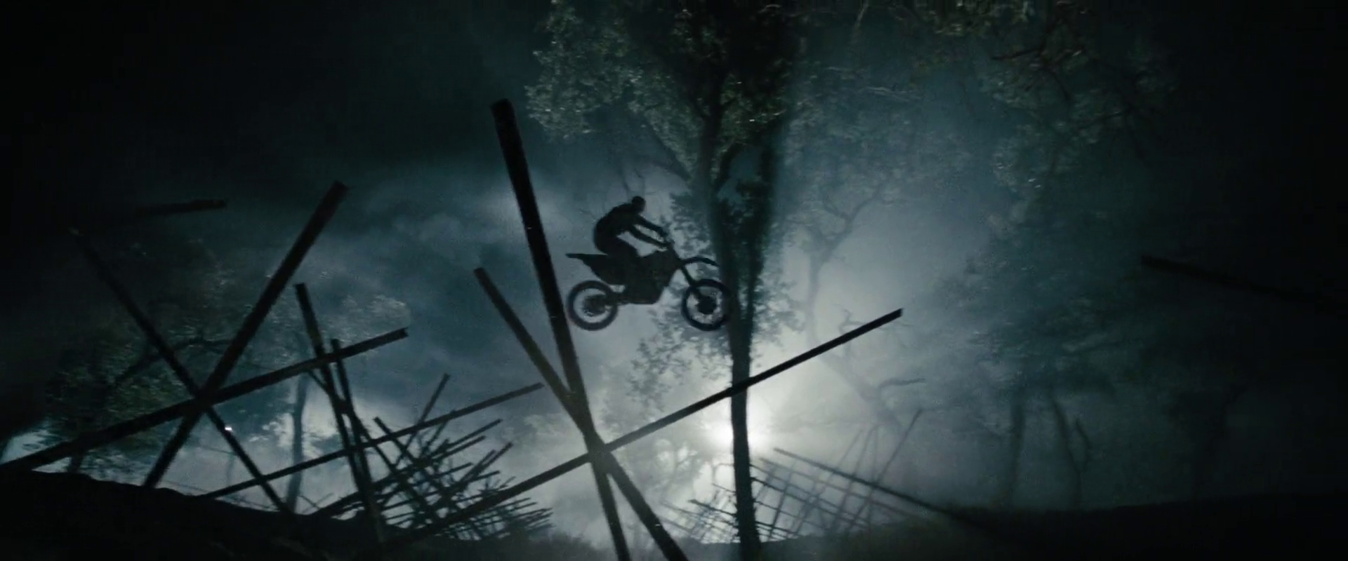 Movie action sequence - Man jumps dirtbike