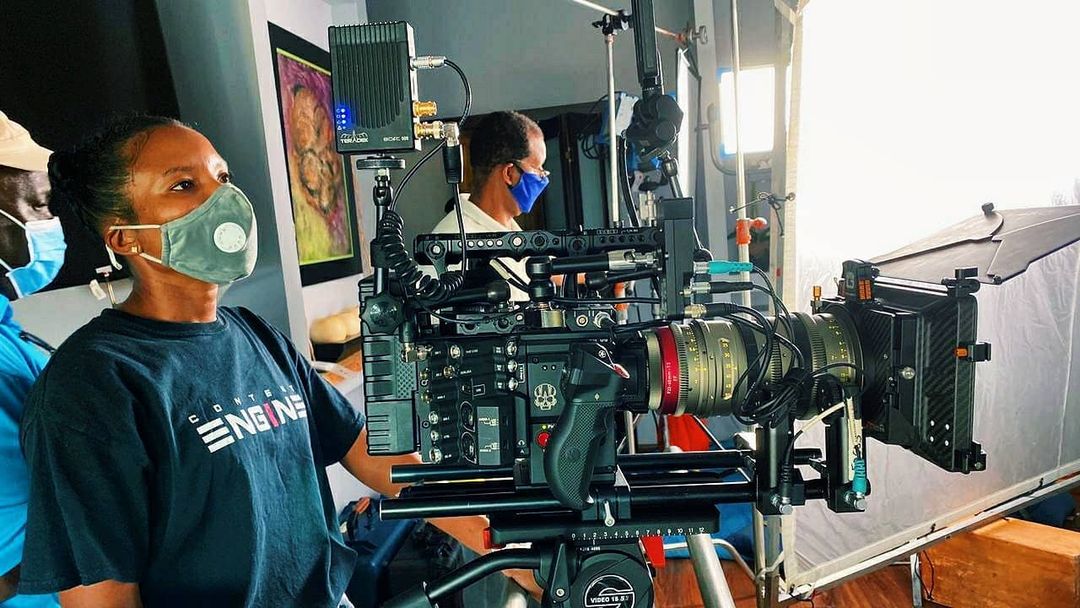Gabrielle Blackwood lining up a short with a RED camera setup