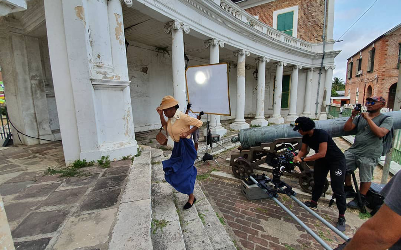 Actress running upstairs