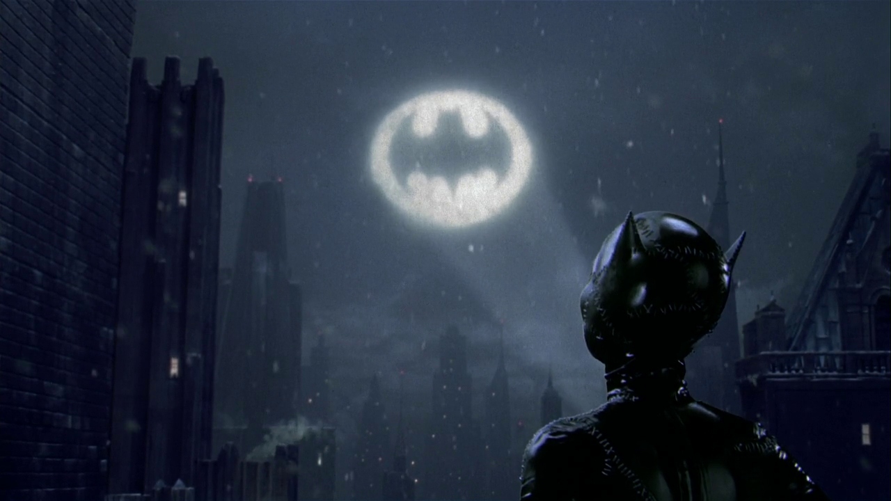 Batman Returns Christmas composition Catwoman looking at bat signal
