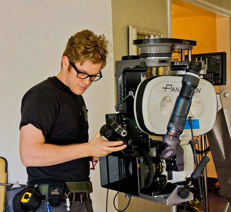 Camera Assistant working on Panavision camera