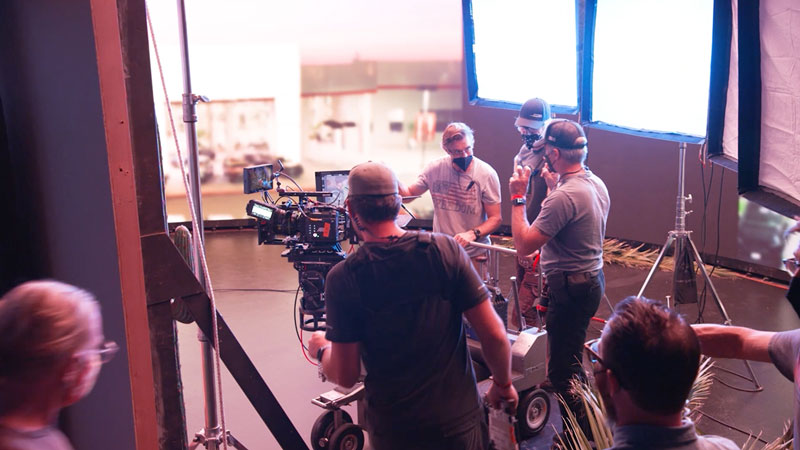 Filmmakers on a commercial set filming TV spot