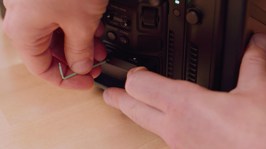 Fasten card reader on Ronin 4D with Allen tool
