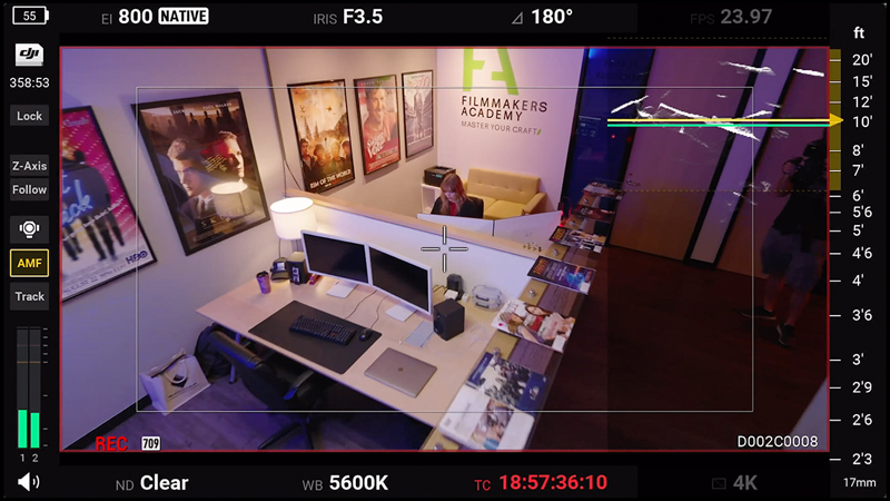 Woman at desk on DJI monitor