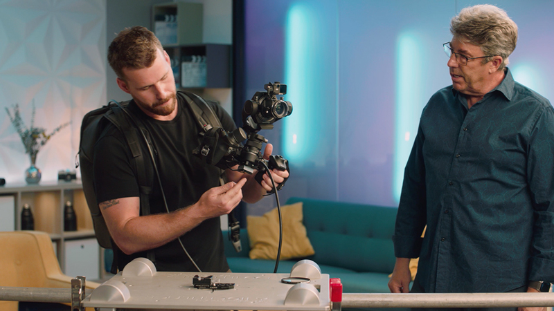 Quick release plate mounted to bottom of DJI Ronin 4D