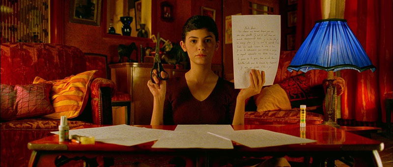 Red wardrobe and interior in Amélie | Claudie Ossard Productions