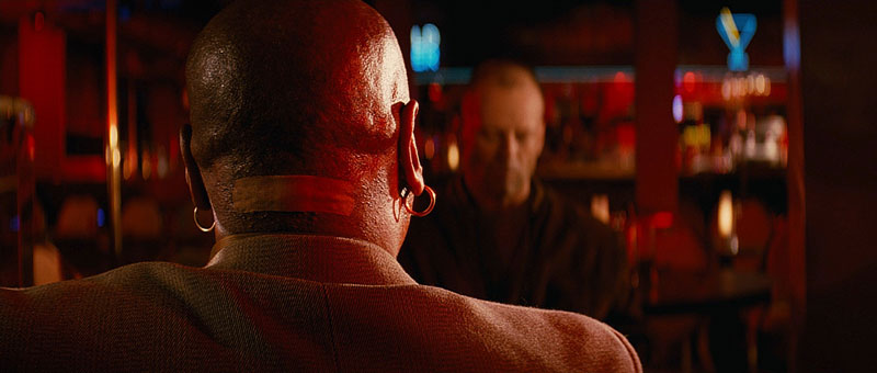 The meeting between Marsellus and Butch bathed in red light | Miramax