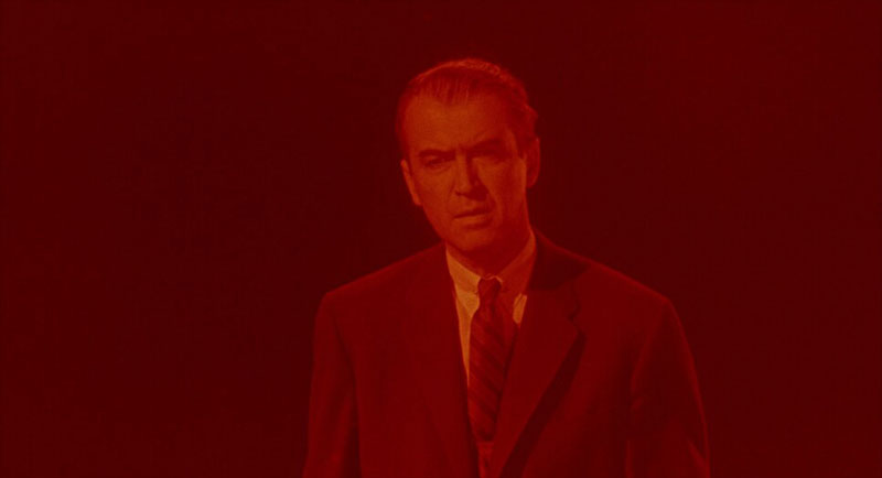 Scottie bathed in red in Vertigo | Alfred J. Hitchcock Productions