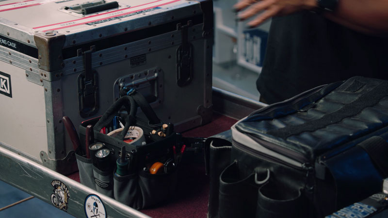 Assistant Camera loads lens cart with murse 