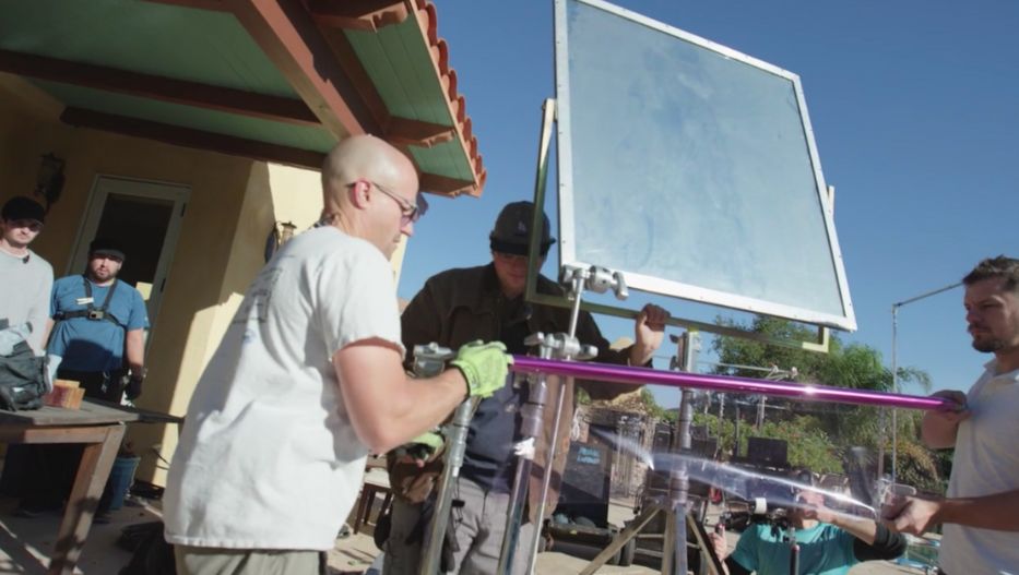 Filmmakers uses a quarter minus green gel to be placed over mirror board for day interior scene