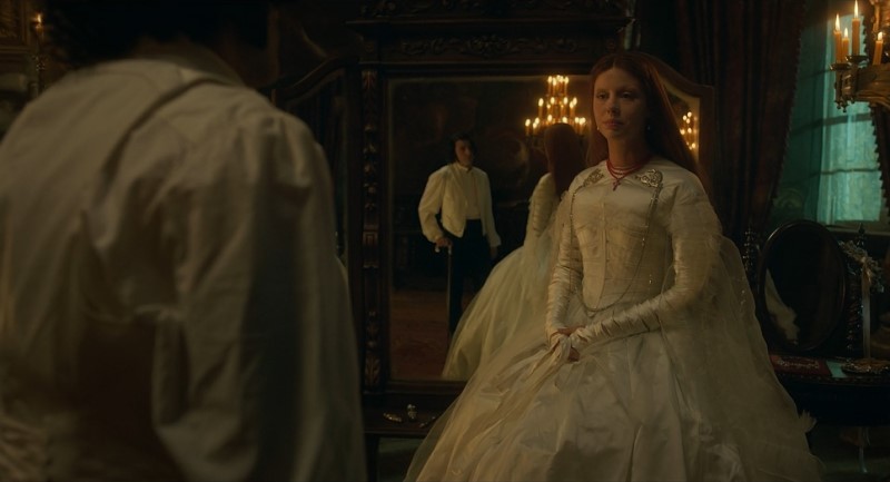 Elizabeth (Mia Goth) in wedding dress