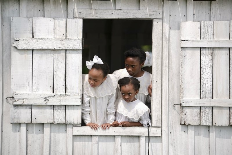Girls in church window in Sinners movie