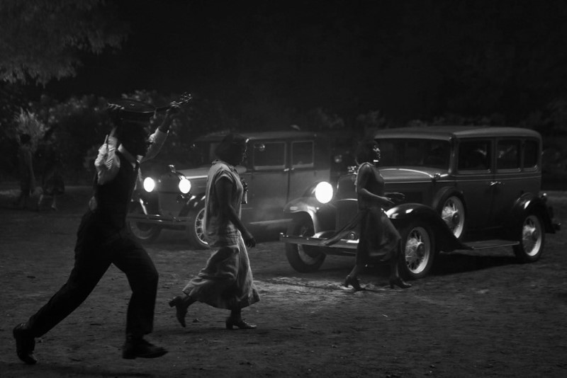 Black and white photograph of extras in Sinners movie