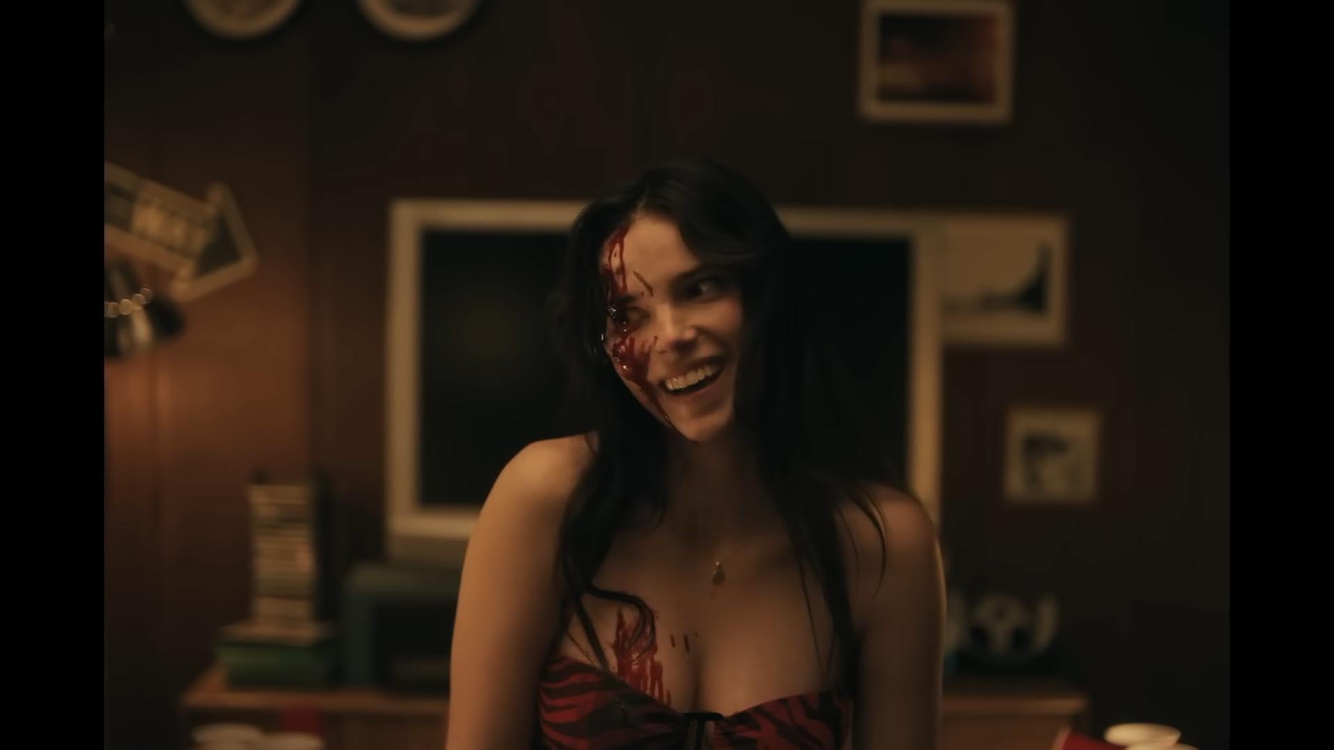 Nikki (Inde Navarrette) in Obsession wears red